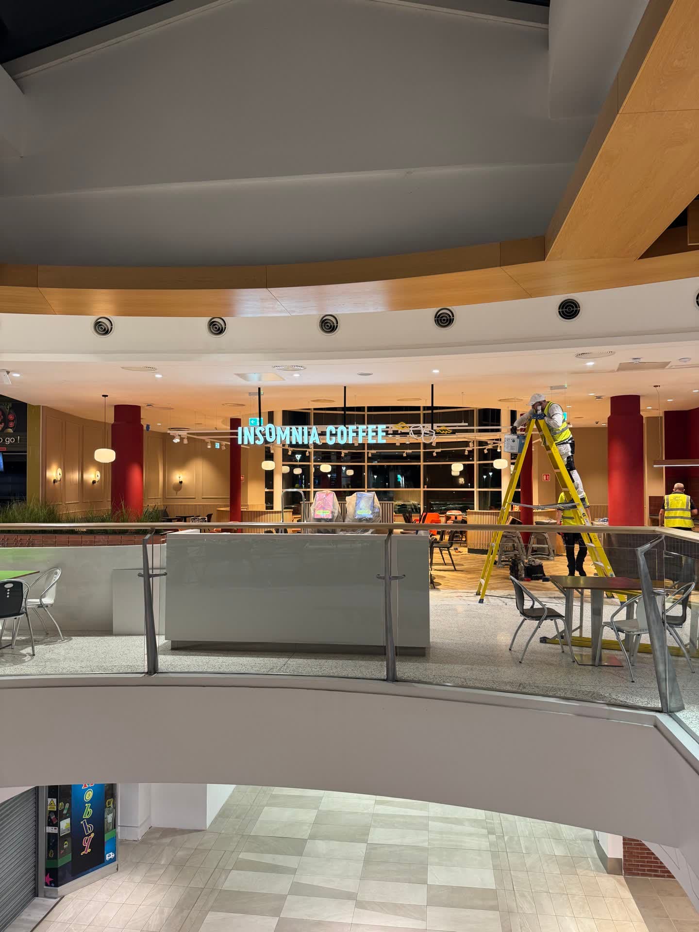 Wide view of Insomnia Coffee unit in Liffey Valley food court showing full lighting installation across ceiling
