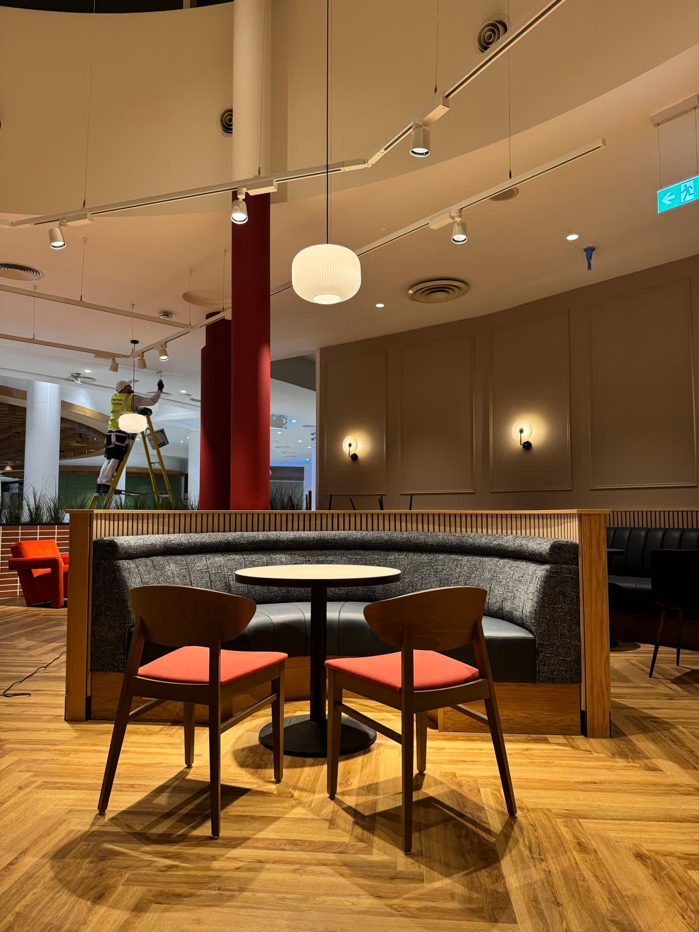 Completed Hillbillies restaurant seating area with wall sconces and recessed lighting installed by GES in Donaghmede, Dublin 13