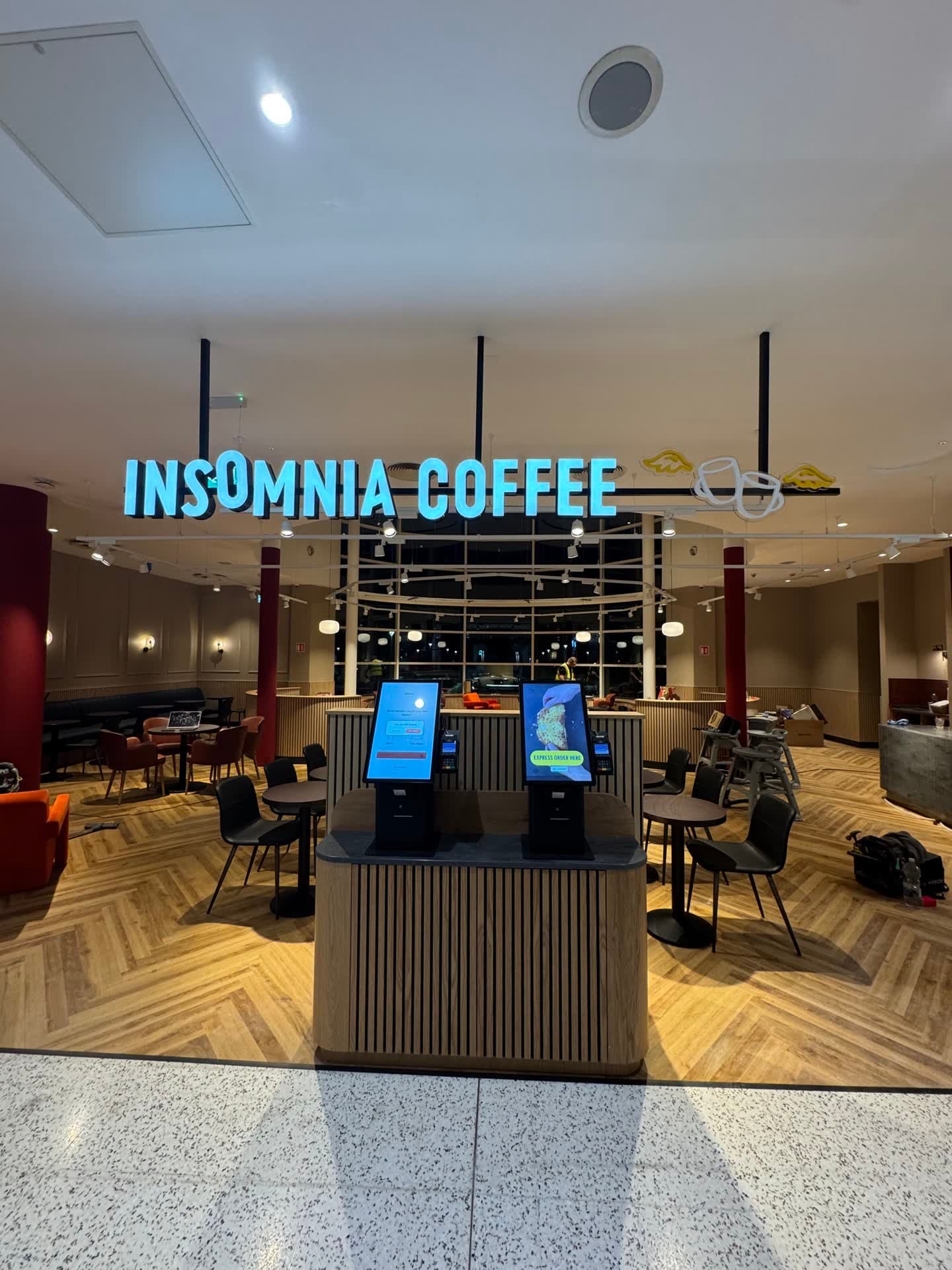 Completed Insomnia Coffee storefront in Liffey Valley food court with illuminated signage and recessed ceiling lighting